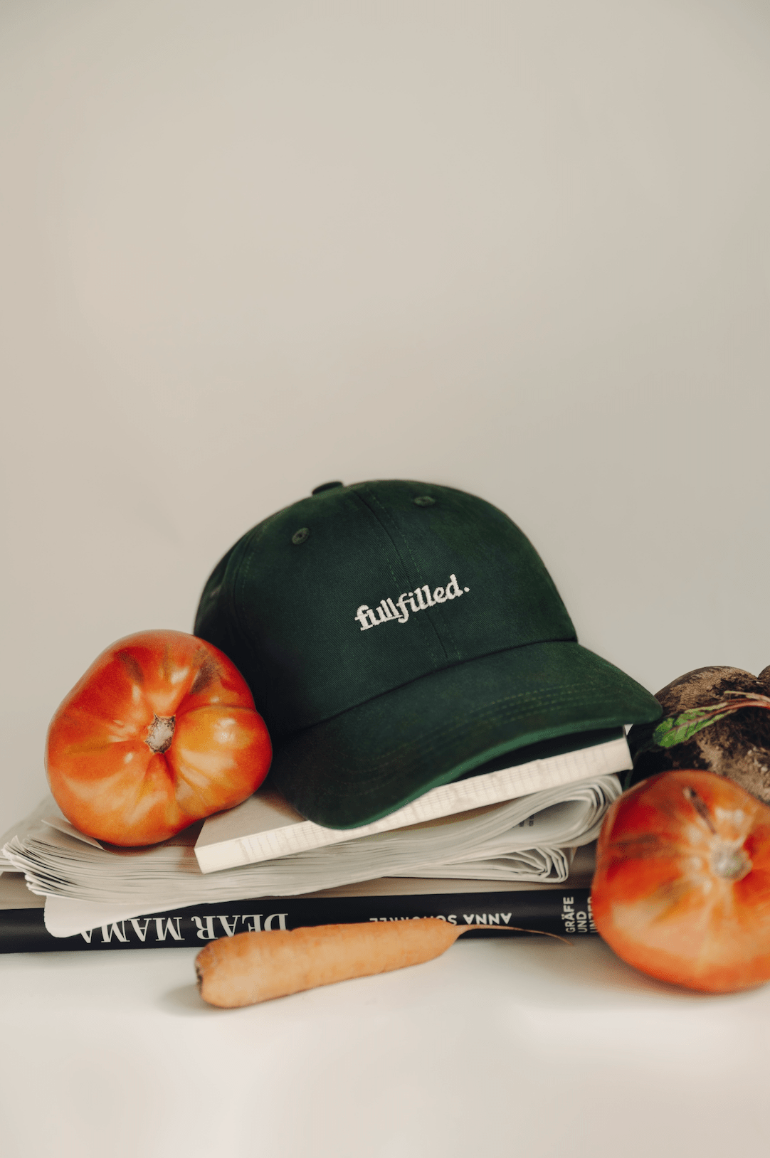 fullfilled Cap on books and vegetables in Berlin